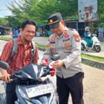 Sat Intelkam Polres Bintan Bagikan 300 Bendera Merah Putih Sambut HUT RI ke-80